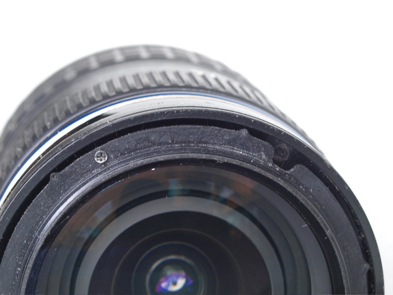 Datei:Oly 12-60 beschaedigt 1.jpg