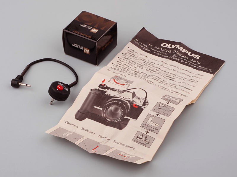 Datei:M.In-Focus Trigger Cord Anleitung.jpg